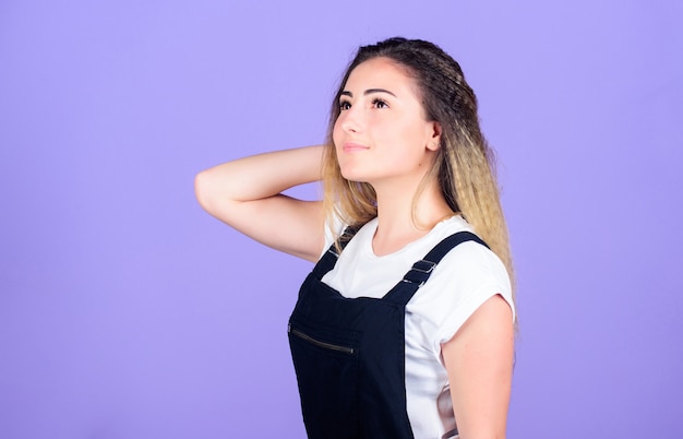 Hair crimping method styling hair becomes wavy zigzag fashion. Woman dreamy face posing with stylish hairstyle on violet background. Voluminous crimped hair. Popular look. Trendy crimped hairstyles.