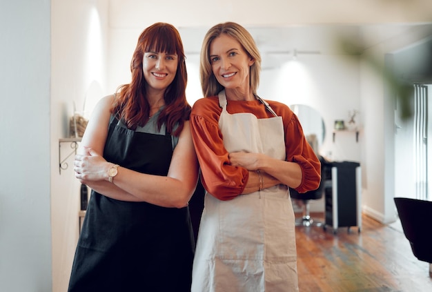 Hair salon friends and portrait of happy hairdressers standing in their small business together Happiness smile and professional women hairstylists with a startup beauty parlor in Australia