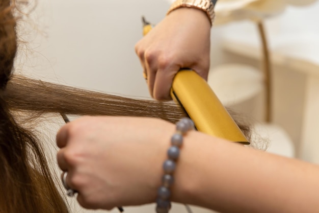 Hair straightening at beauty salon