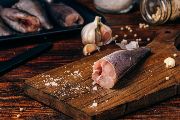 Hake carcasses on cutting board