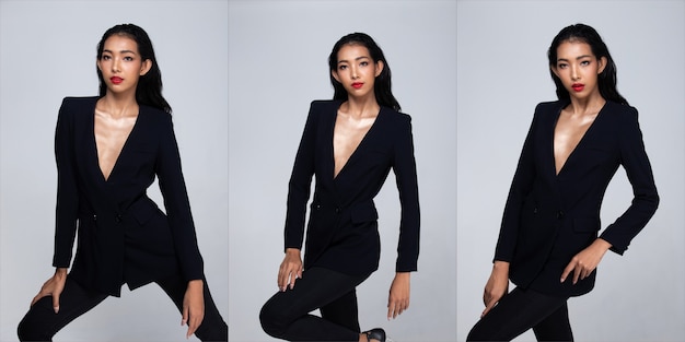 Half Body Portrait of 20s Asian Woman black hair wear clothes pant. Office female express feeling on face and look at camera over gray Background isolated