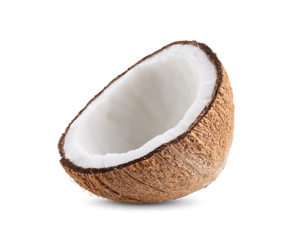 Half coconut on white wall.