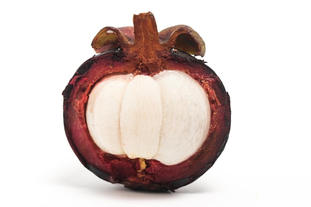 Half cut sliced fresh organic mangosteen delicious fruit isolated on white background clipping path