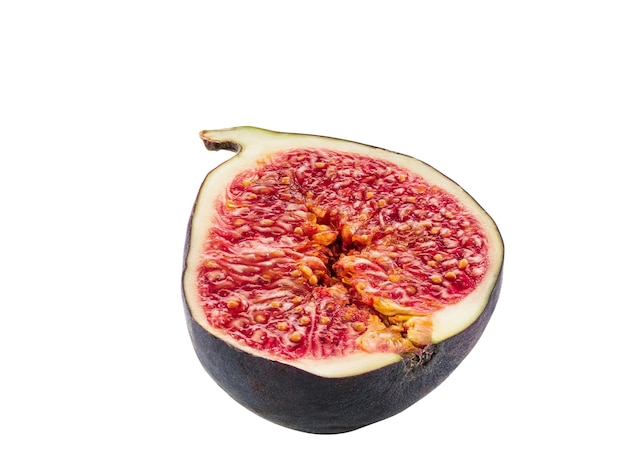 Half of a delicious purple fig isolated on white background with copy space for text or images Soft mellow fruit skin is very thin red flesh has many small seeds inside of it Side view Closeup shot