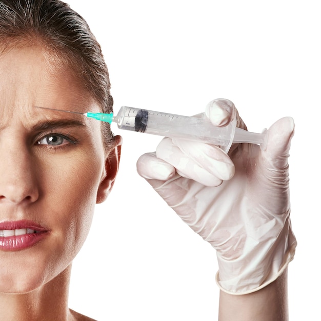 Half face forehead and syringe in hand with glove for dermatology skincare or beauty treatment in anti age and facial Female person frown and portrait for medical aesthetic on mockup space