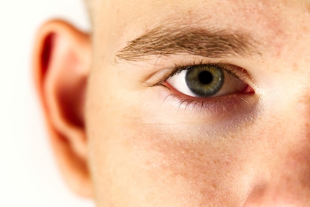 Half face of a young man