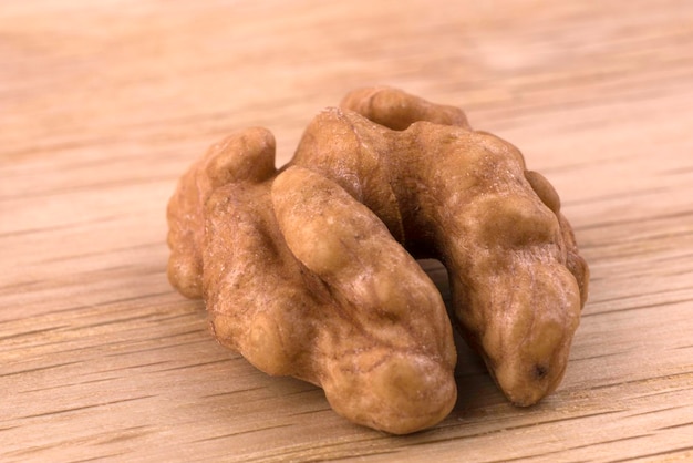 Half of large walnuts closeup on the table