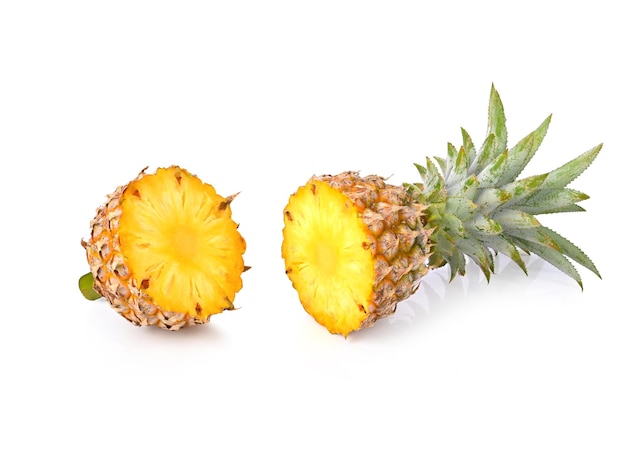 Half of pineapple isolated on white background