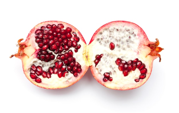 Half pomegranate on a white