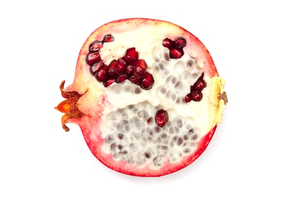 Half pomegranate on a white