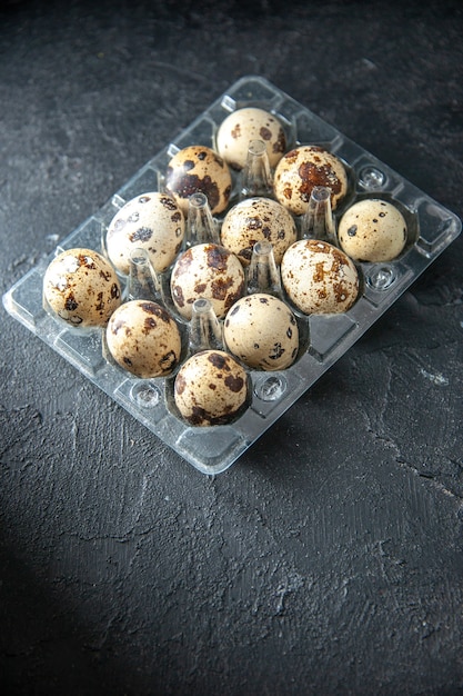 half-top view fresh quail eggs on dark background pie breakfast morning tea bread milk bird animal