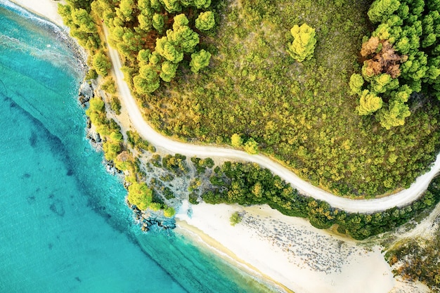 Halkidiki, Sitonia from Above, Greece. Summer travel vacation background. Landscape with the sea, road and forest. Flat lay