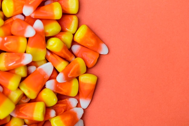 Halloween candy corn sweet background with copy space