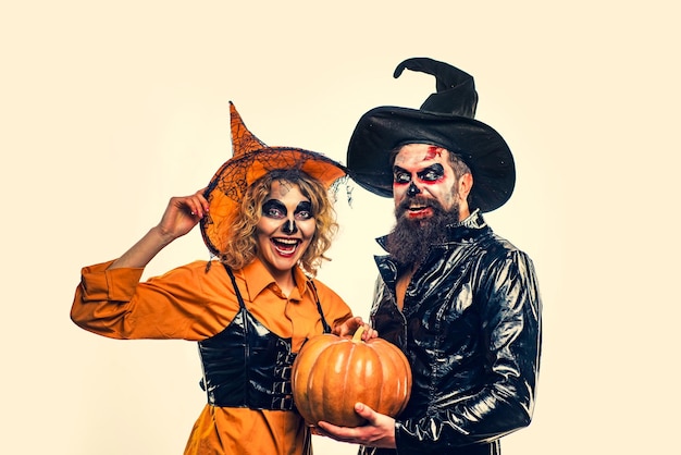 Halloween couple with pumpkin celebrating happy Halloween Jackolanterns