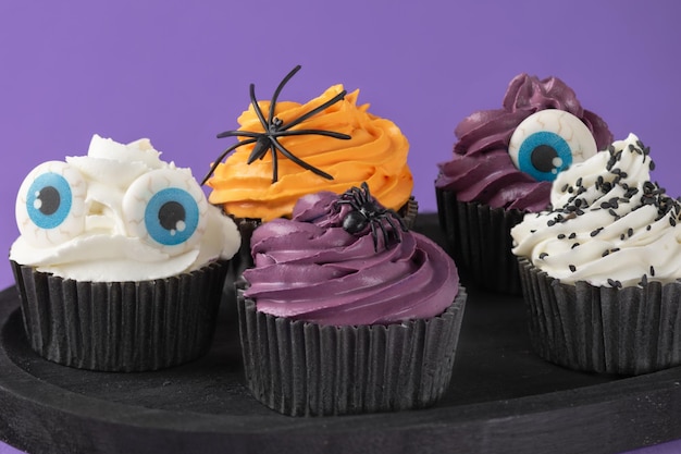 Halloween cupcakes with buttercream and holiday decoration. Halloween muffin Halloween creative food