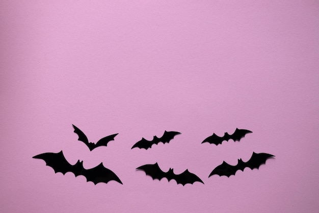 Halloween and decoration concept paper bats flying