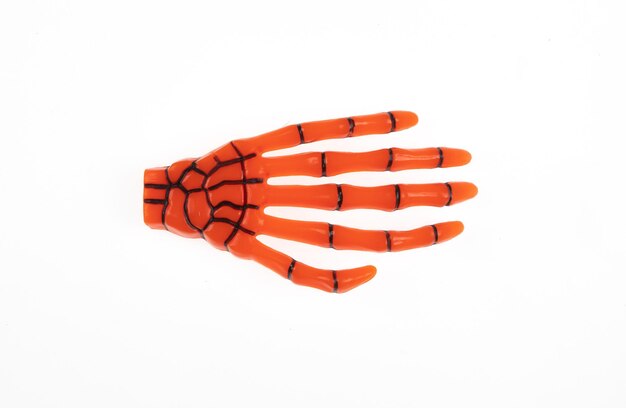 halloween orange skeleton hand isolated on white background