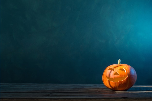 Halloween pumpkin on dark surface