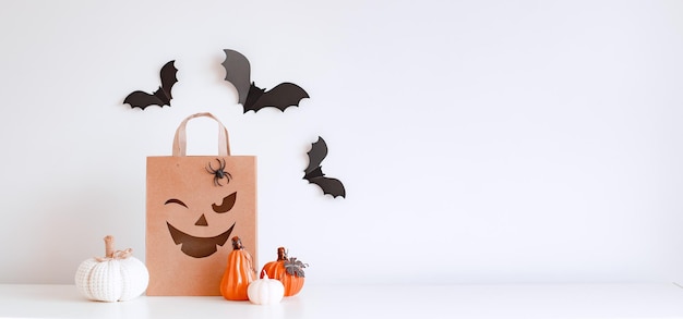 Halloween pumpkins bats and shopping bag Happy halloween concept