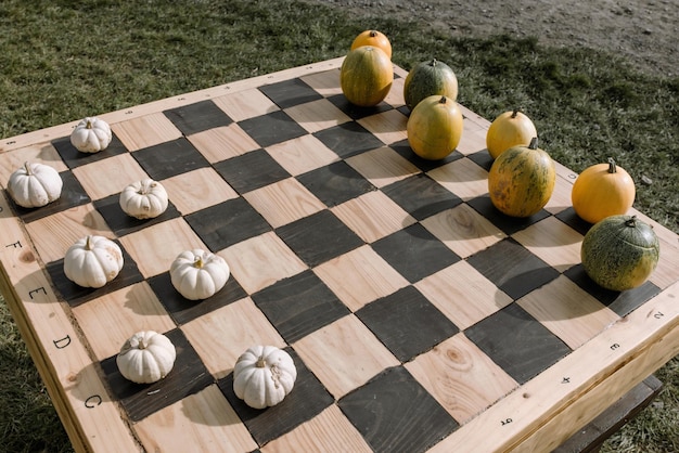 Halloween pumpkins on chess board fall decoration