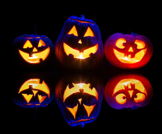 Halloween pumpkins glowing inside