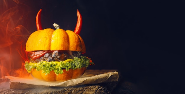 Halloween tasty burger on dark background