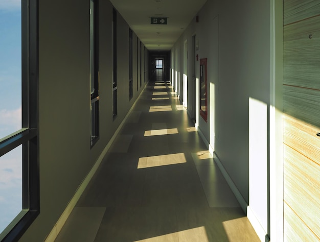 Hallway with glass windows in condominium