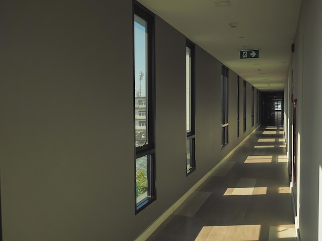 Hallway with glass windows in condominium