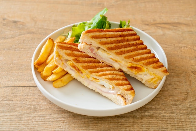 ham cheese sandwich with egg and fries