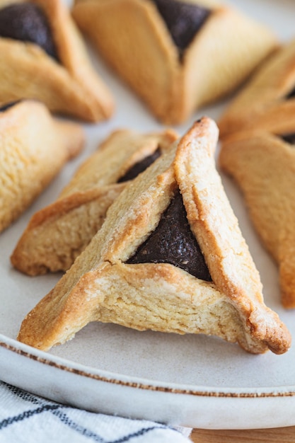 Hamantaschen cookies with chocolate for purim Traditional Jewish dessert