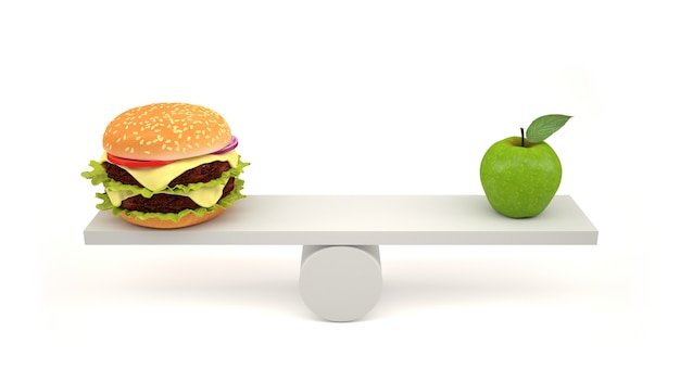 Hamburger and green apple on scales.