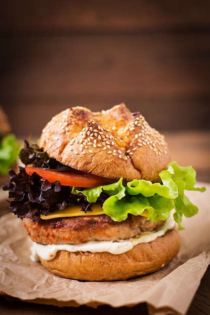 hamburger with juicy turkey burger, cheese, tomato and tartar sauce