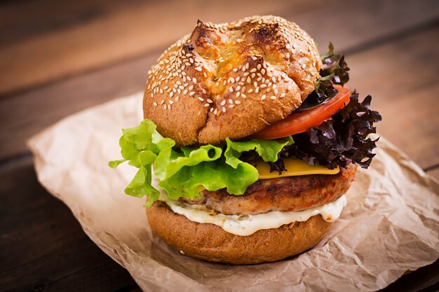 hamburger with juicy turkey burger, cheese, tomato and tartar sauce