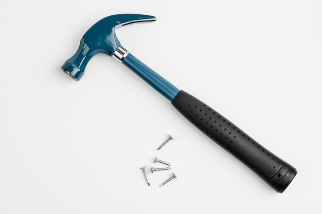 Hammer and nails on a white background