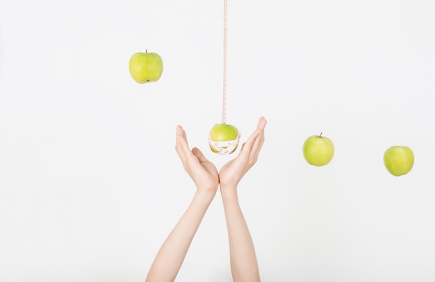 Hand and apple with good health and shape