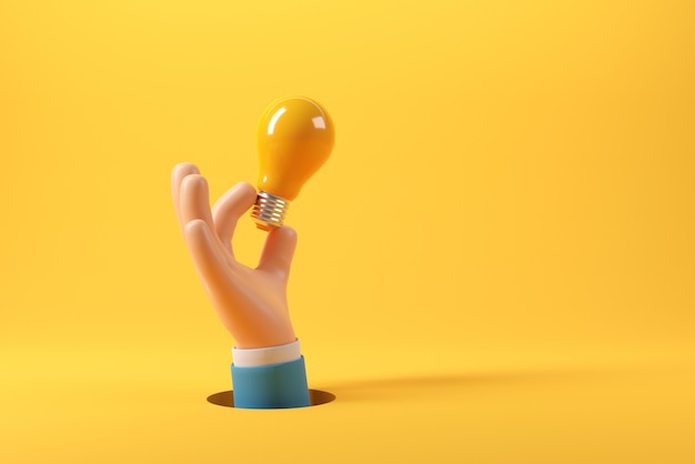 Hand of businessman holding light bulb on yellow background