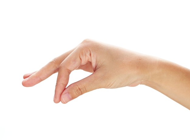 Photo hand of a caucasian female to hold some tiny or thin object