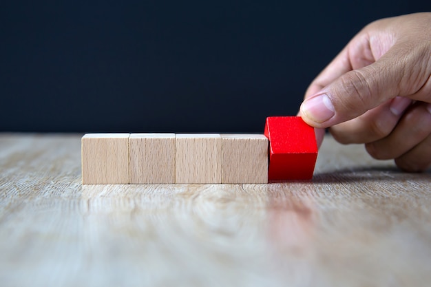 Hand choose red wooden blocks with out graphic.