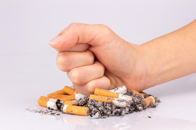 Hand cigarette white stop pile