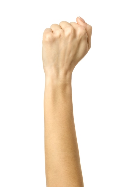 Hand clenched in a fist. Vertical image. Woman hand with french manicure gesturing isolated on white background. Part of series