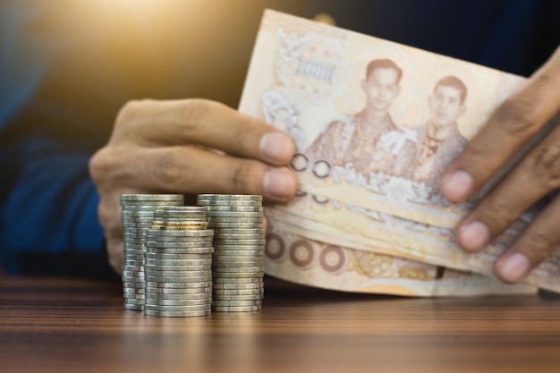 Hand counting money coins stack business finance