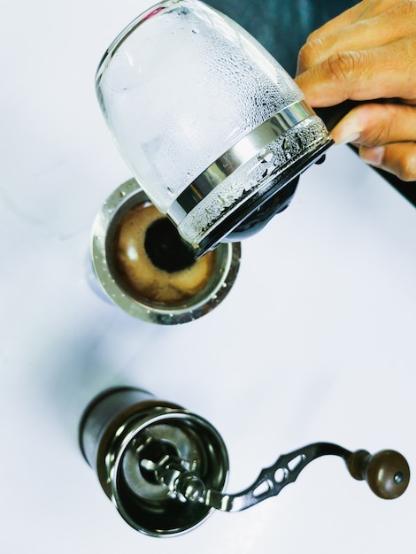 Hand drip coffee, Barista making drip coffee. Top view