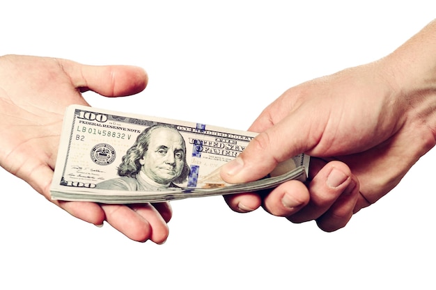 Hand giving money isolated on a white background