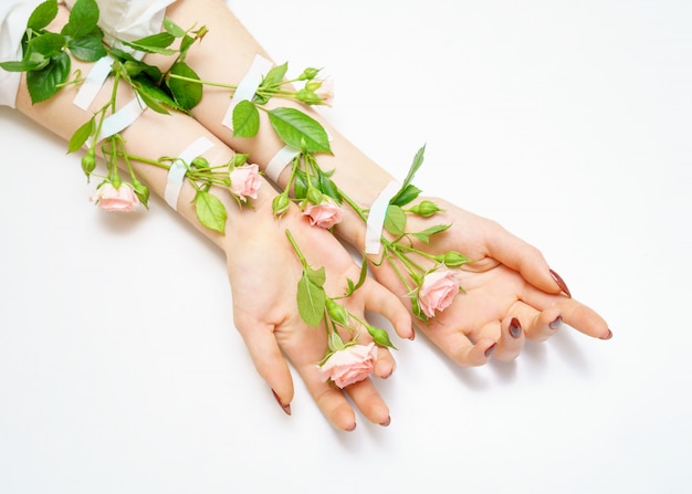 Hand in hand pink rose buds on hands, 