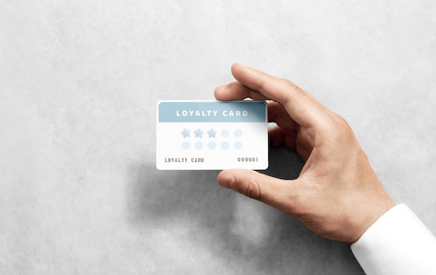 Hand hold discount card mockup with rounded corners