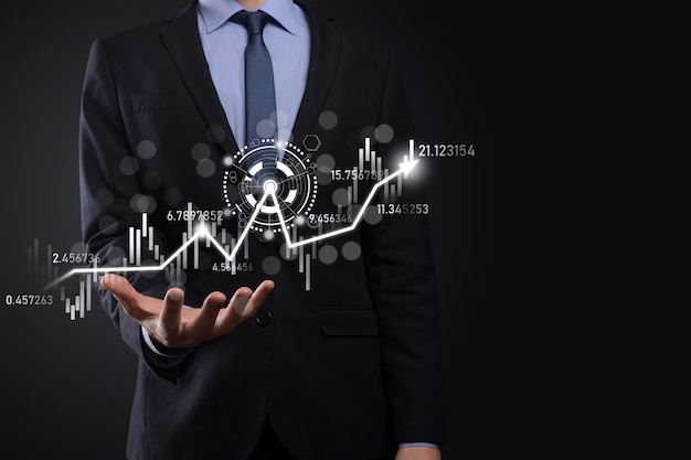 Hand hold sales data and economic growth graph chart. Business planning and strategy. Analysing trading of exchange. Financial and banking. Technology digital marketing.Profit and growing plan.