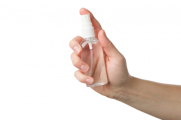 Hand holding antiseptic antibacterial disinfectant isolated on white.