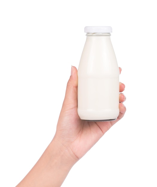 hand holding Bottle of milk isolated on white background