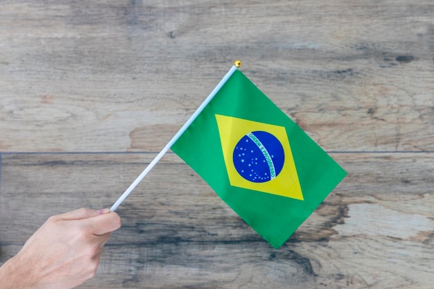 Hand holding Brazilian flag september 7th independence of brazil