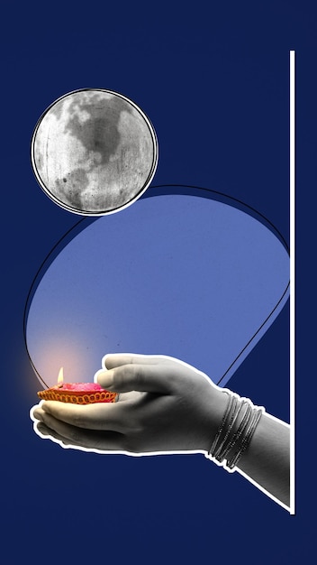 Photo a hand holding a candle in front of a moon